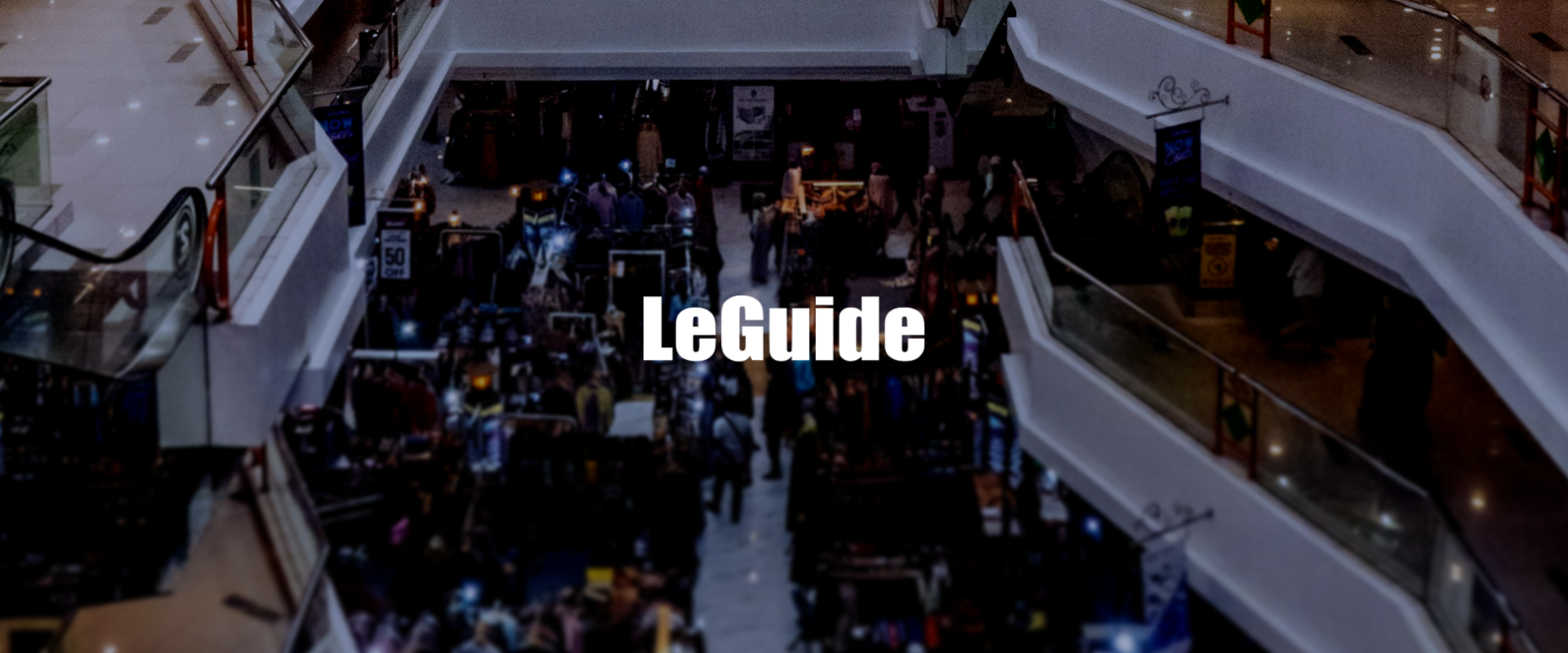 logo leguide avec un centre commercial en arrière plan.